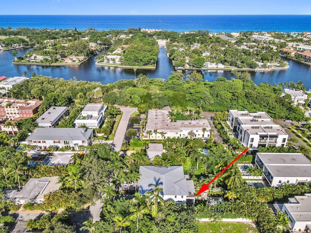 birds eye view of property featuring a water view