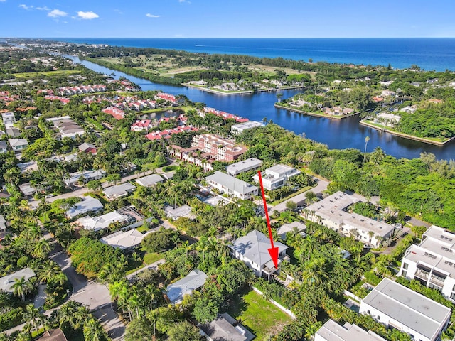 bird's eye view with a residential view and a water view