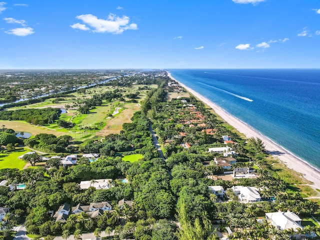 bird's eye view with a water view and a beach view