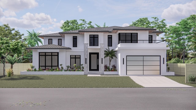 view of front of property featuring a front yard and a garage