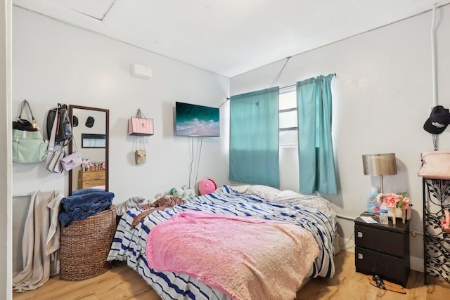 bedroom featuring light hardwood / wood-style flooring