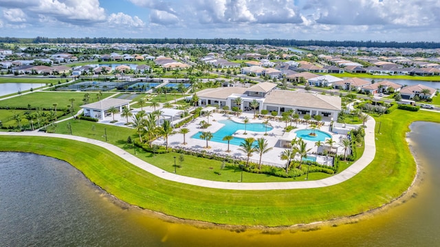 bird's eye view with a water view