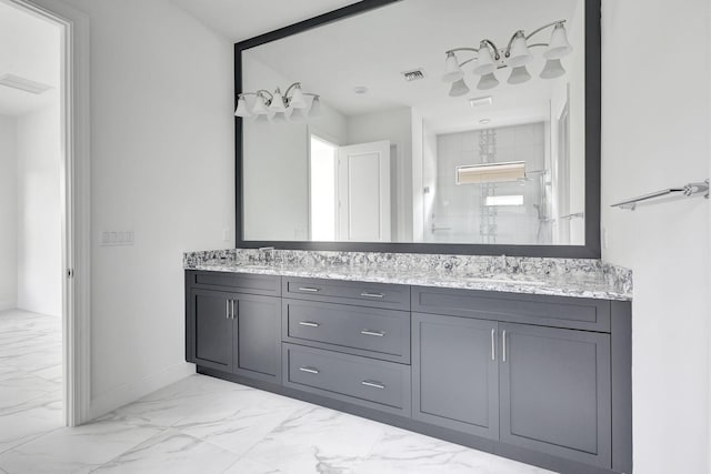 bathroom featuring vanity and walk in shower