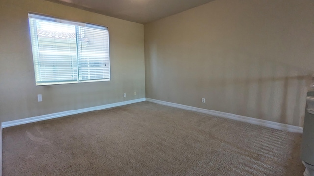 empty room featuring carpet flooring