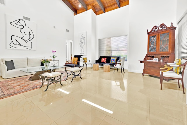 tiled living room featuring beamed ceiling, high vaulted ceiling, and wood ceiling