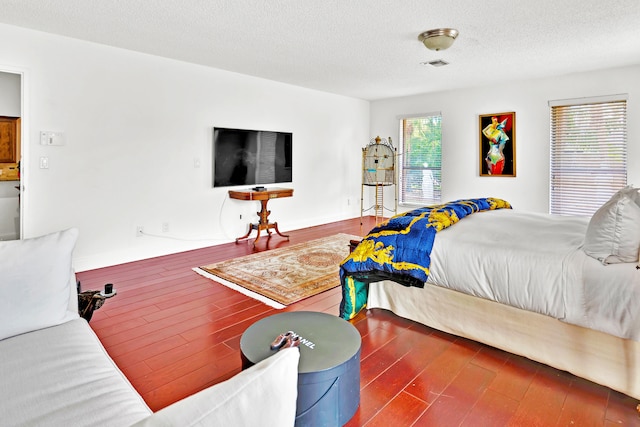 bedroom featuring a textured ceiling