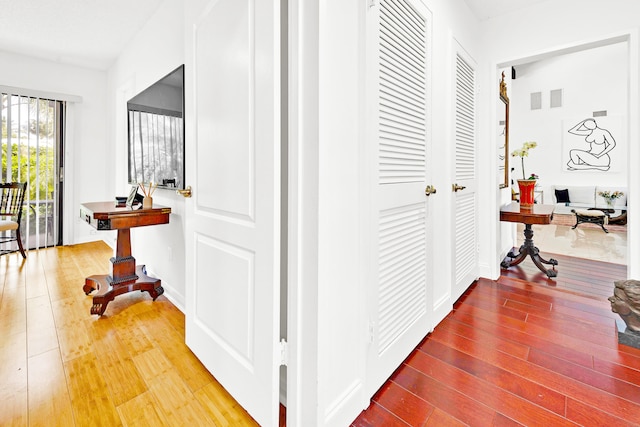 hall featuring wood-type flooring