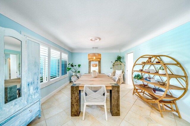 view of tiled dining space