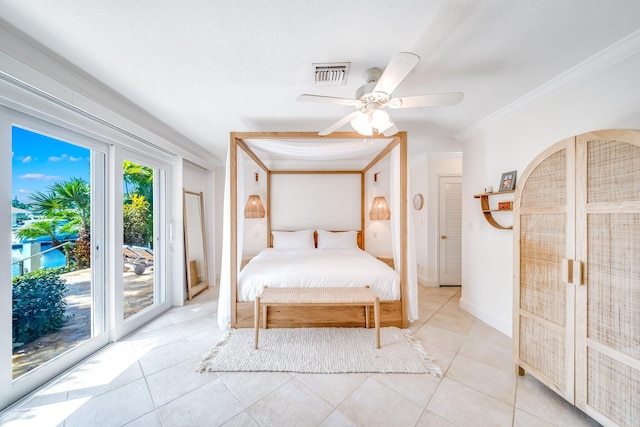 tiled bedroom with ceiling fan, crown molding, and access to exterior