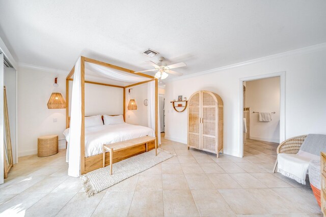 tiled bedroom with ceiling fan and ornamental molding