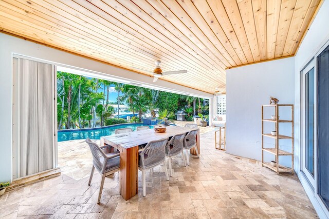 view of patio / terrace featuring ceiling fan