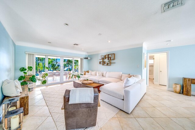 tiled living room with french doors