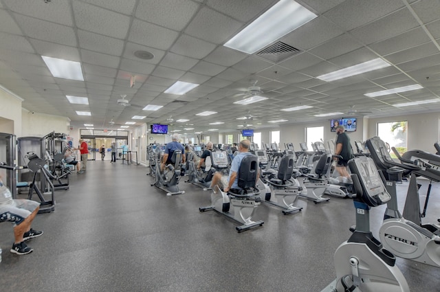 workout area featuring a paneled ceiling