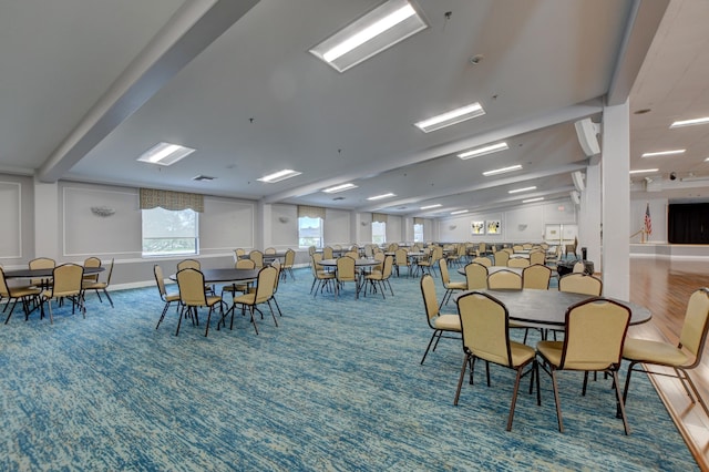 dining room featuring carpet flooring