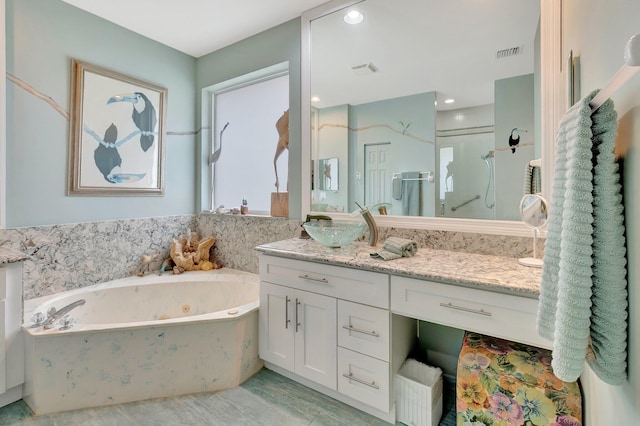 bathroom featuring recessed lighting, vanity, visible vents, a tub with jets, and a stall shower