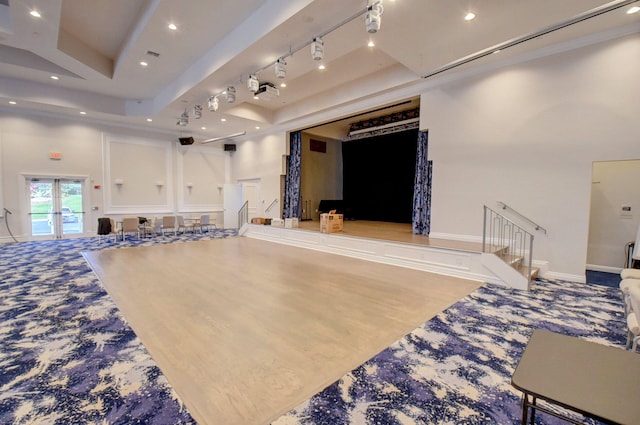 living area with baseboards, stairs, french doors, track lighting, and recessed lighting