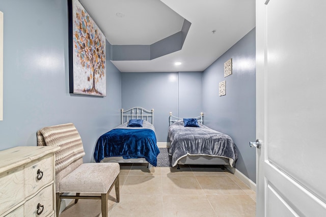 tiled bedroom with baseboards