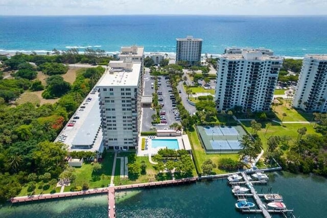 birds eye view of property featuring a water view