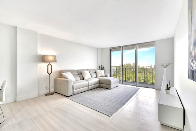 living room with floor to ceiling windows