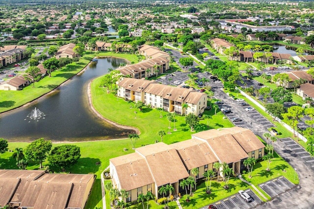 aerial view with a water view and a residential view