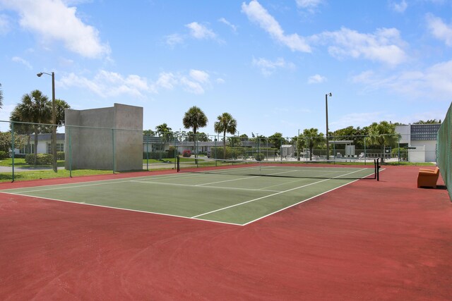 view of sport court featuring basketball hoop