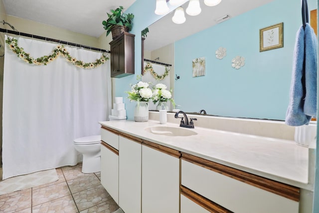 bathroom with toilet, vanity, visible vents, and a shower with curtain