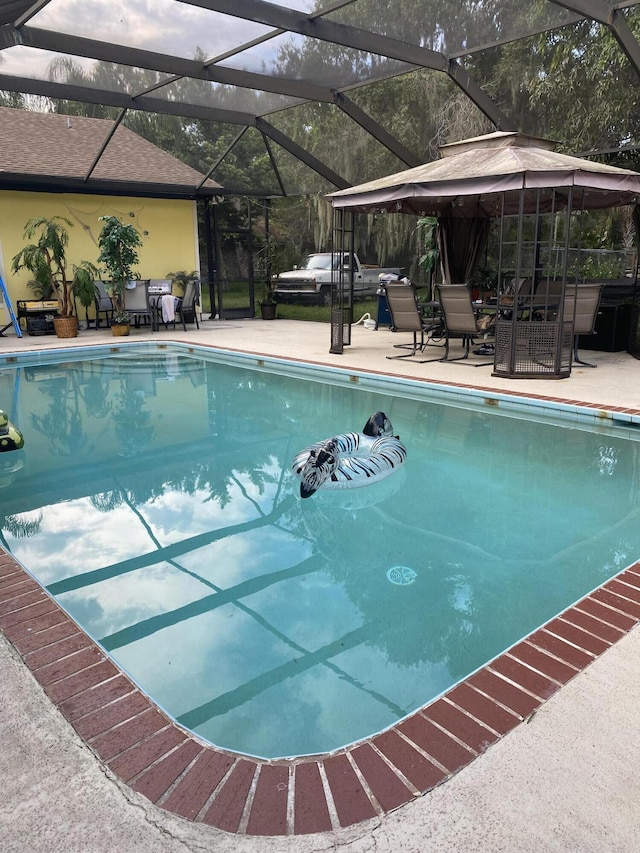 pool with a patio