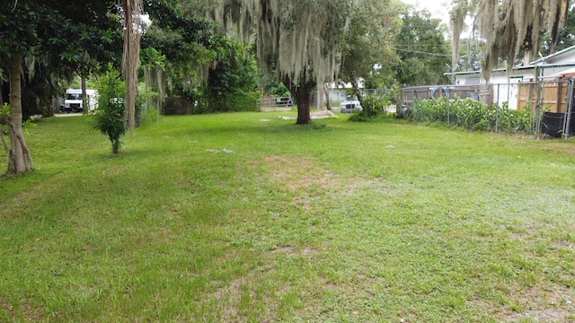 view of yard with fence