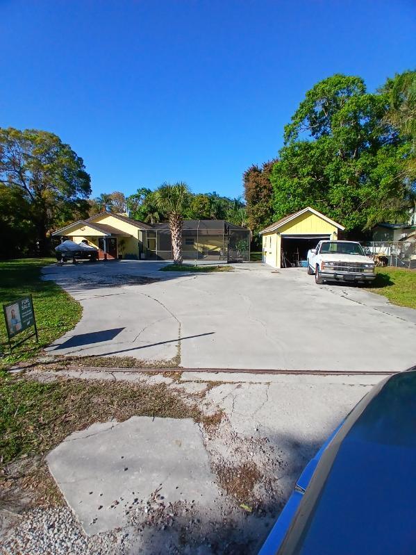 view of yard featuring a garage