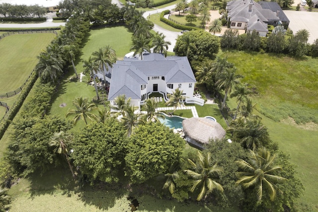 birds eye view of property featuring a rural view