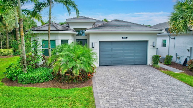 view of front of property with a garage