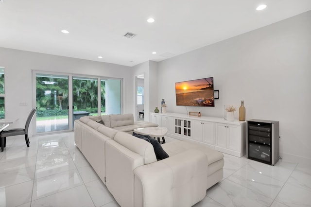 tiled living room featuring beverage cooler