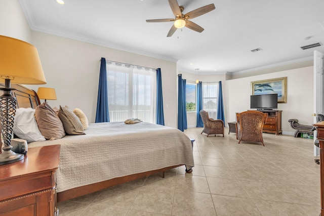 bedroom featuring ceiling fan, crown molding, and light tile patterned floors