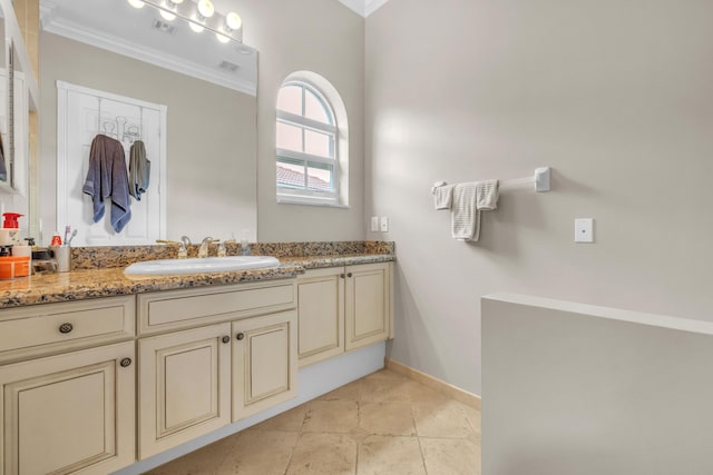 9229 Delemar Ct, Wellington, FL 33414 - bathroom with crown molding, vanity, baseboards, and tile patterned floors