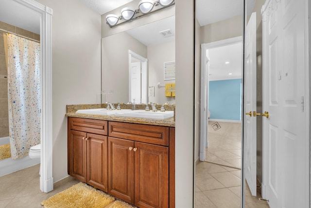 9229 Delemar Ct, Wellington, FL 33414 - bathroom with tile patterned flooring, toilet, curtained shower, double vanity, and baseboards