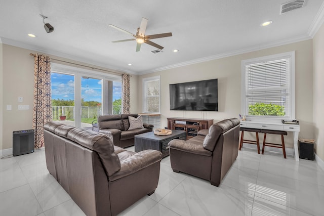 tiled living room with ceiling fan, a textured ceiling, and crown molding