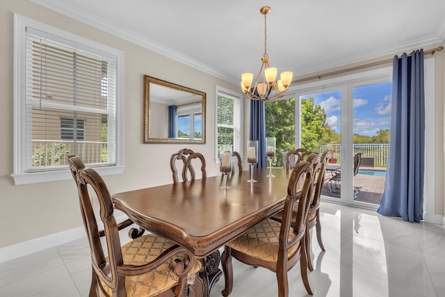 dining area with ornamental molding, light tile patterned flooring, a chandelier, and a healthy amount of sunlight