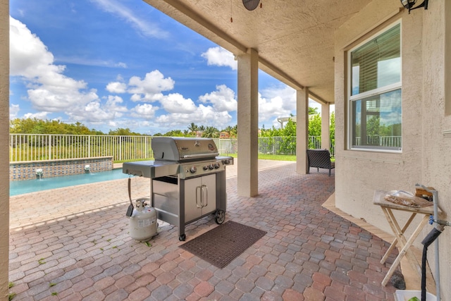 9229 Delemar Ct, Wellington, FL 33414 - view of patio with a fenced backyard and area for grilling