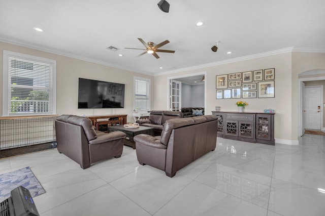 9229 Delemar Ct, Wellington, FL 33414 - living room with ceiling fan, plenty of natural light, ornamental molding, recessed lighting, and arched walkways