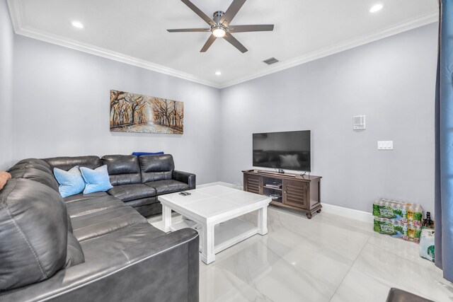 9229 Delemar Ct, Wellington, FL 33414 - living area with a ceiling fan, crown molding, recessed lighting, light marble finish floors, and baseboards