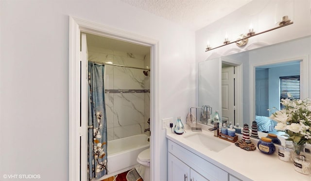 bathroom featuring a textured ceiling, toilet, vanity, and shower / tub combo with curtain