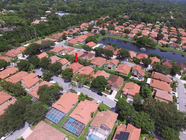 aerial view featuring a water view and a residential view