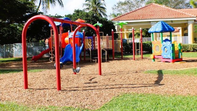 communal playground featuring fence