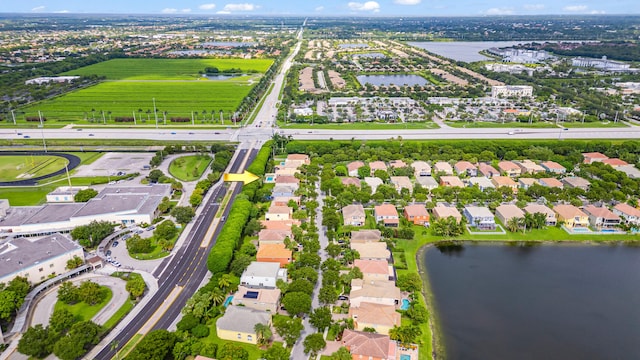 drone / aerial view featuring a water view