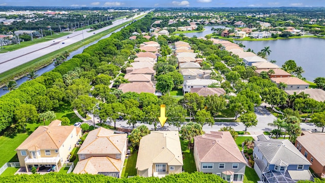 bird's eye view with a water view