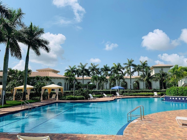 view of swimming pool featuring a gazebo