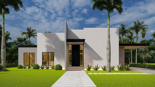 contemporary house with stucco siding and a front lawn