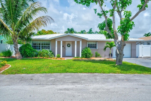 ranch-style house featuring a front lawn