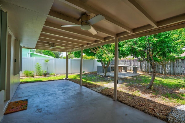 view of patio featuring ceiling fan