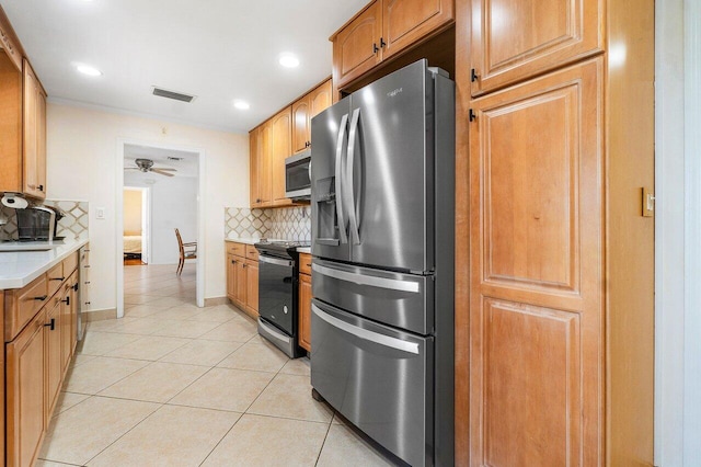 interior space with backsplash, stainless steel dishwasher, crown molding, sink, and light tile patterned flooring